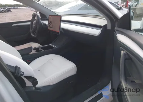 2023 Tesla Model Y Awd/Long Range Dual Motor All-Wheel Drive из США, поврежденный, VIN 7SAYGDEE0PA105157